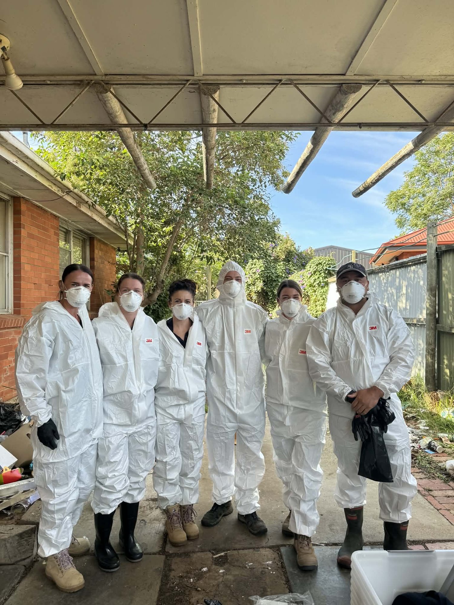 Murray’s specialist cleaning team wearing full protective equipment